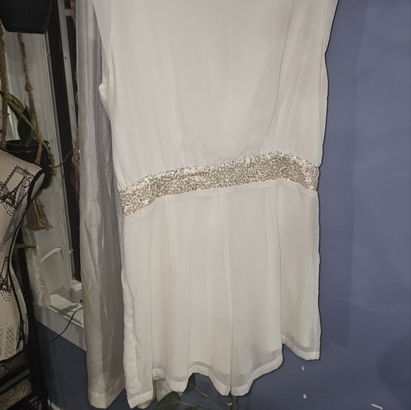 3/20.00. Classy white romper with sequins. - Picture 8 of 10